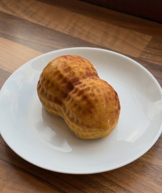 Choux bun on a white plate