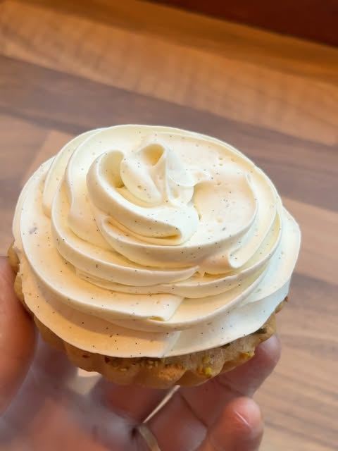 Tart topped with piped cream